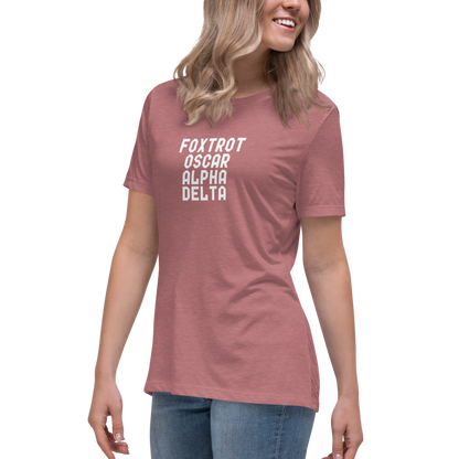 "Foxtrot Oscar Alpha Delta" printed on a heather mauve women's relaxed t-shirt worn by a female