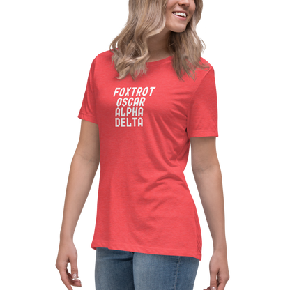 "Foxtrot Oscar Alpha Delta" printed on a heather red women's relaxed t-shirt worn by a female