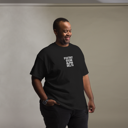 "Foxtrot Oscar Alpha Delta" printed on a black unisex classic tee worn by a male