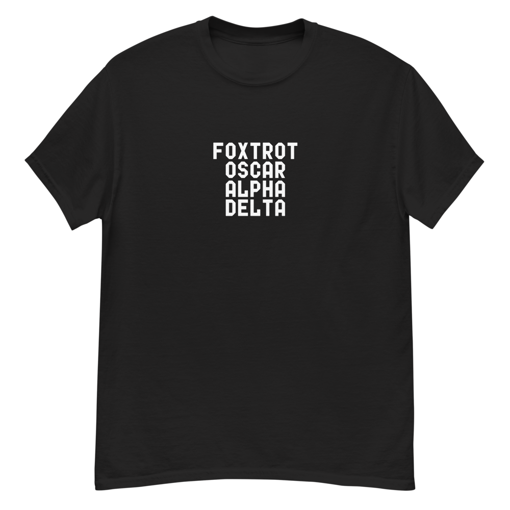 "Foxtrot Oscar Alpha Delta" printed on a black unisex classic tee laying on a flat surface