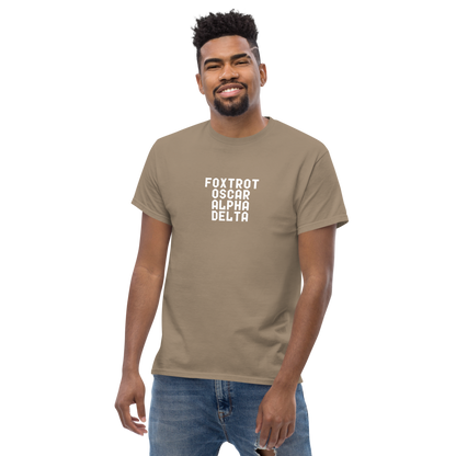 "Foxtrot Oscar Alpha Delta" printed on a brown savana unisex classic tee worn by a male