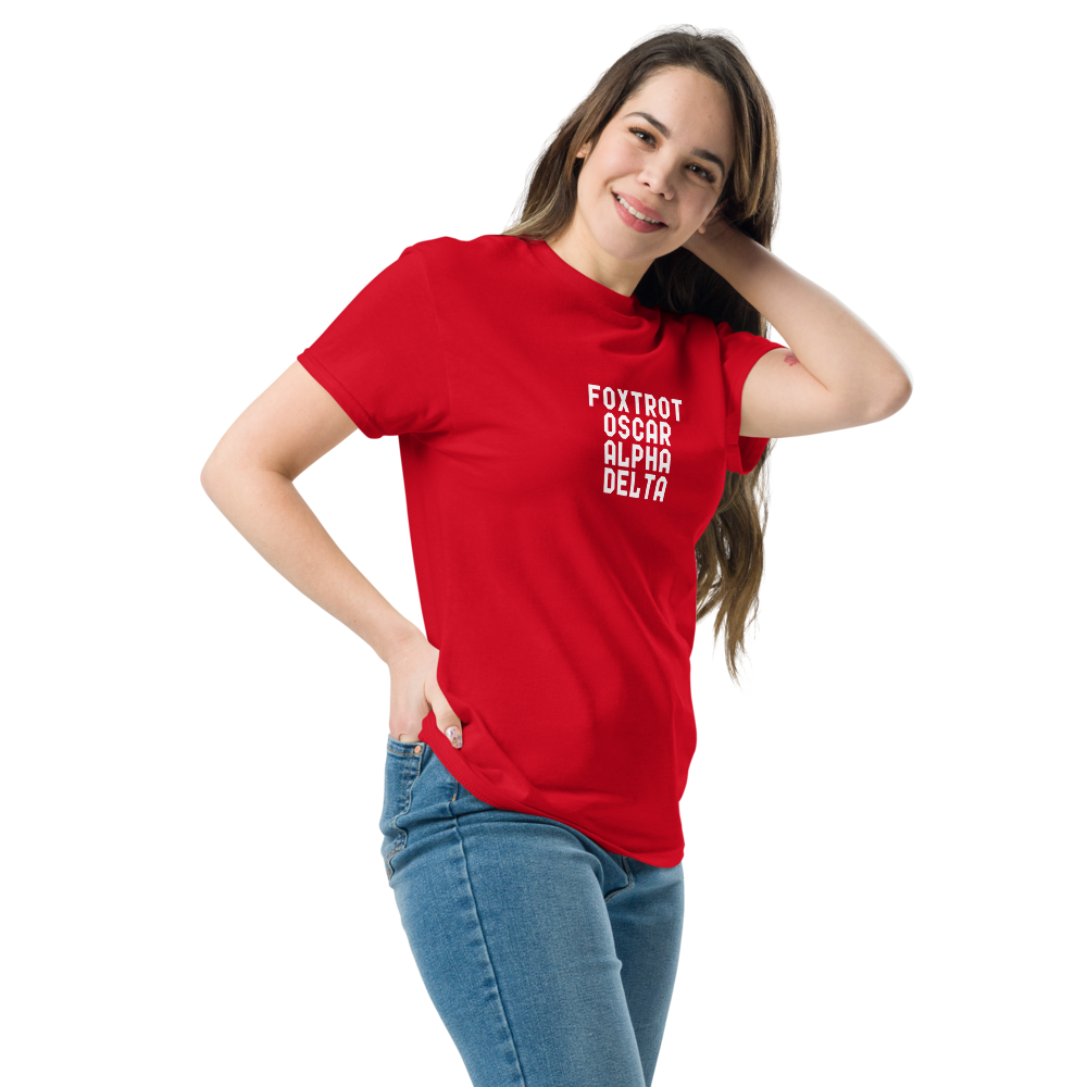 "Foxtrot Oscar Alpha Delta" printed on a red unisex classic tee worn by a female