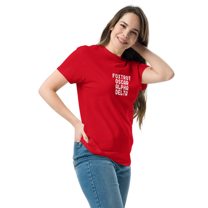 "Foxtrot Oscar Alpha Delta" printed on a red unisex classic tee worn by a female