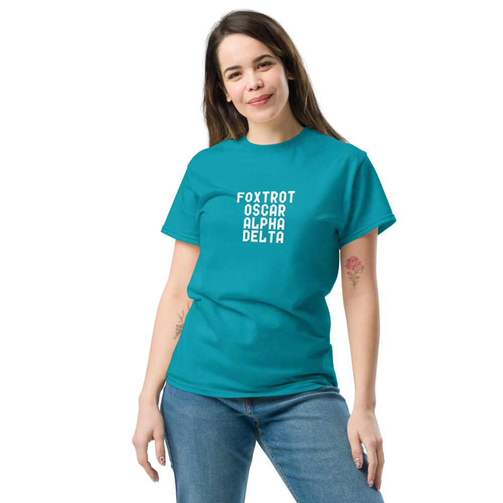 "Foxtrot Oscar Alpha Delta" printed on a tropical blue unisex classic tee worn by a female