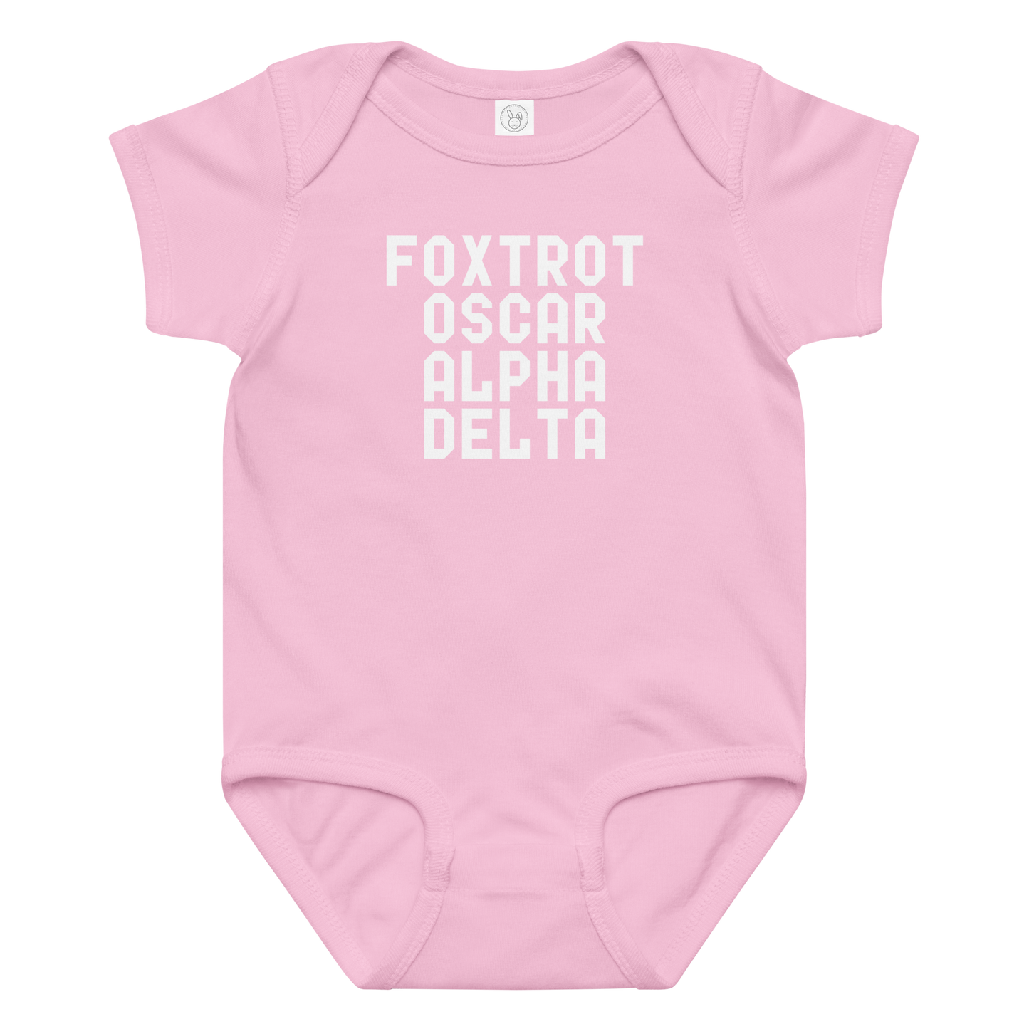 "Foxtrot Oscar Alpha Delta" printed on a pink baby jersey bodysuit laying on a flat surface amongst other clothes