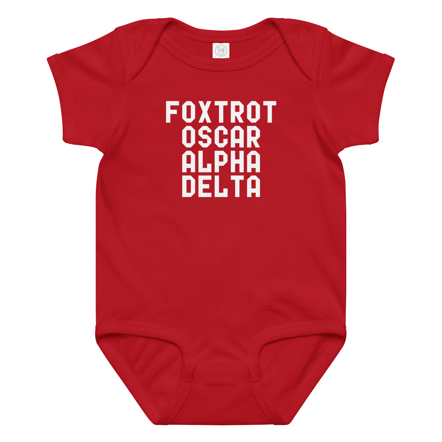 "Foxtrot Oscar Alpha Delta" printed on a red baby jersey bodysuit laying on a flat surface amongst other clothes