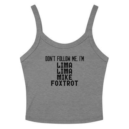 "Don’t follow me, I'm Lima Lima Mike Foxtrot" printed on a athletic heather women's micro-rib tanktop laying on a flat surface amongst sunglasses and shorts