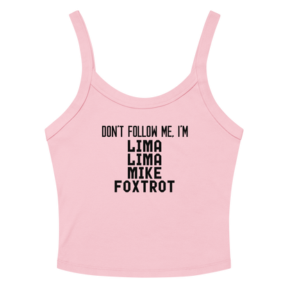 "Don’t follow me, I'm Lima Lima Mike Foxtrot" printed on a solid pink blend women's micro-rib tanktop laying on a flat surface amongst sunglasses and shorts