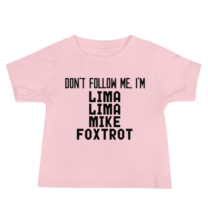 "Don’t follow me, I'm Lima Lima Mike Foxtrot" printed on a pink baby jersey short sleeve tee laying on a flat surface