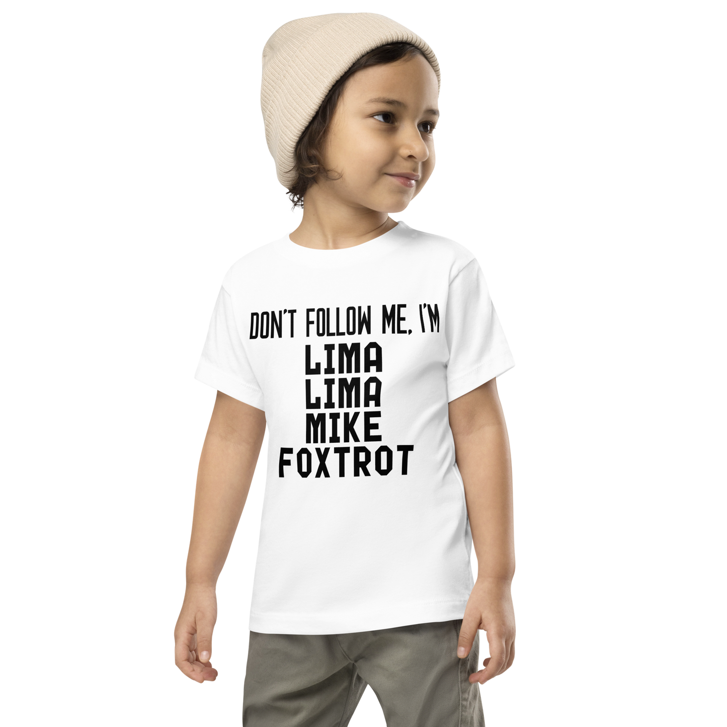 "Don’t follow me, I'm Lima Lima Mike Foxtrot" printed on a white toddler short sleeve tee worn by a male wearing a cap