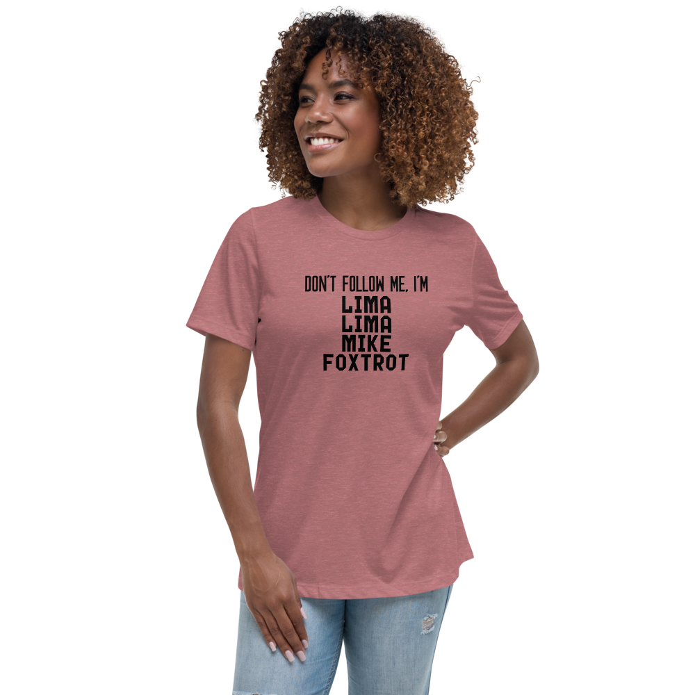 "Don’t follow me, I'm Lima Lima Mike Foxtrot" printed on a heather mauve women's relaxed t-shirt worn by a female