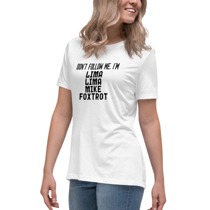 "Don’t follow me, I'm Lima Lima Mike Foxtrot" printed on a white women's relaxed t-shirt worn by a female