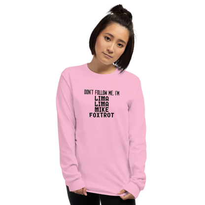 "Don’t follow me, I'm Lima Lima Mike Foxtrot" printed on a light pink men's long sleeve shirt worn by a female