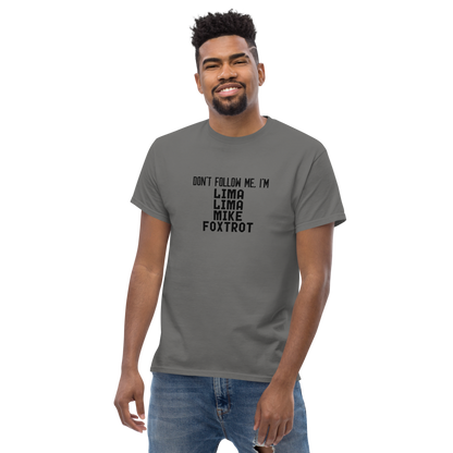 "Don’t follow me, I'm Lima Lima Mike Foxtrot" printed on a charcoal unisex classic tee worn by a male
