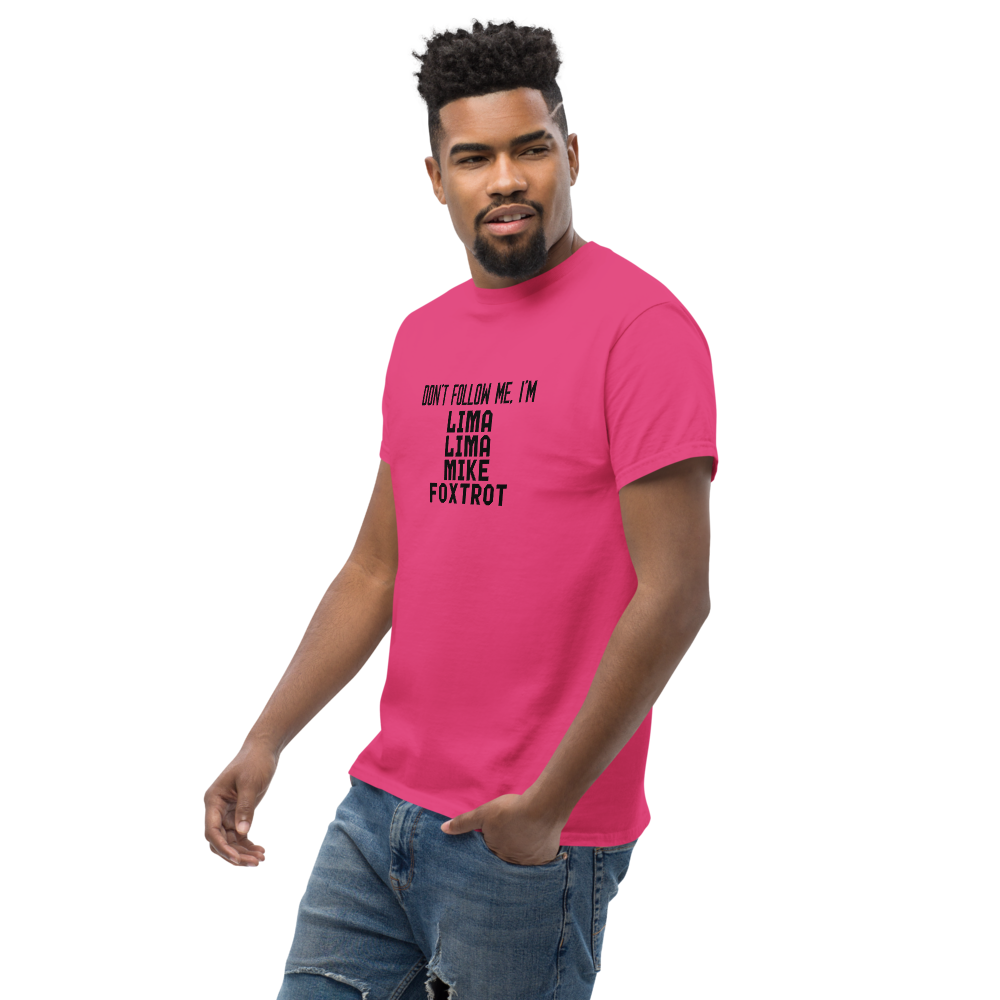 "Don’t follow me, I'm Lima Lima Mike Foxtrot" printed on a heliconia unisex classic tee worn by a male