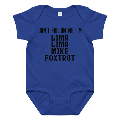 "Don’t follow me, I'm Lima Lima Mike Foxtrot" printed on a royal baby jersey bodysuit laying on a flat surface amongst other clothes