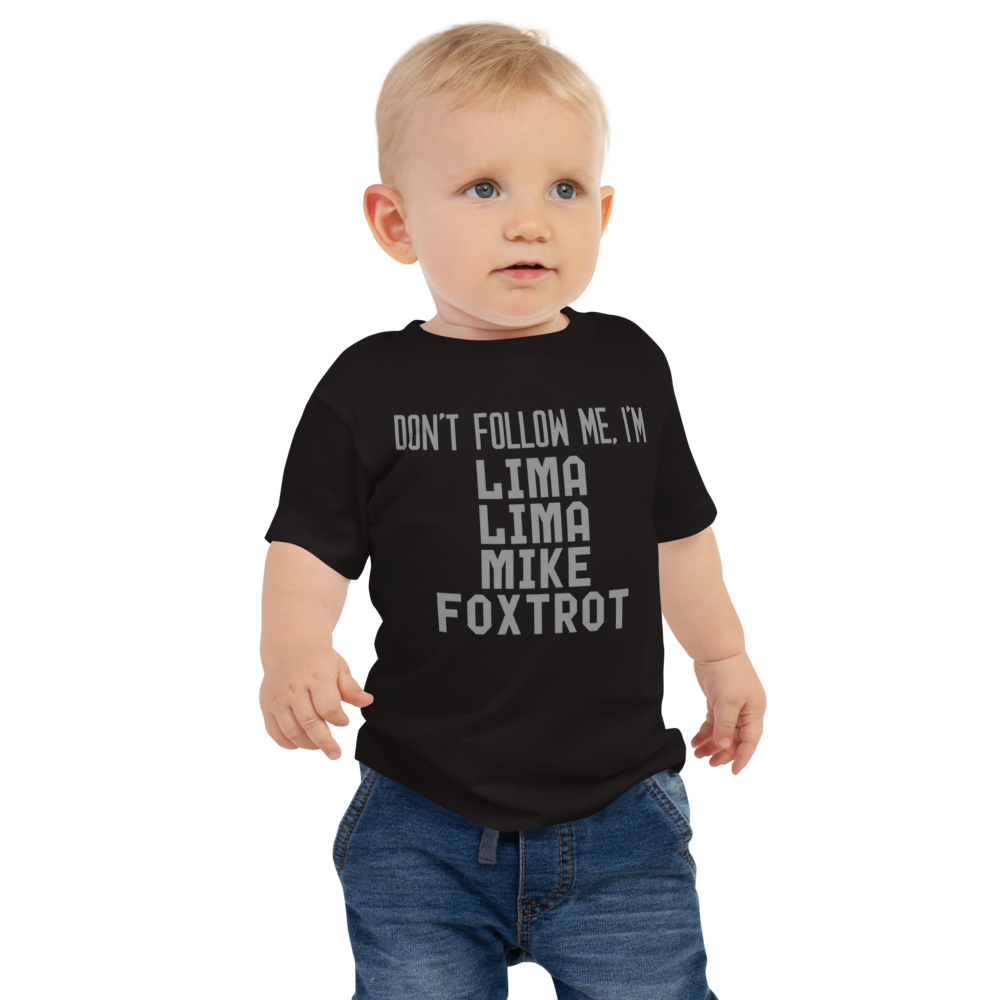 "Don’t follow me, I'm Lima Lima Mike Foxtrot" printed on a black baby jersey short sleeve tee worn by a male