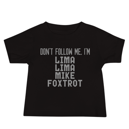 "Don’t follow me, I'm Lima Lima Mike Foxtrot" printed on a black baby jersey short sleeve tee laying on a flat surface