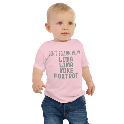 "Don’t follow me, I'm Lima Lima Mike Foxtrot" printed on a pink baby jersey short sleeve tee worn by a male