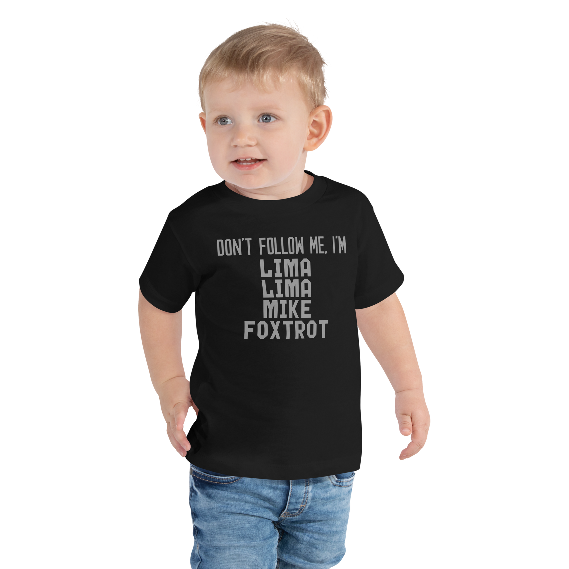 "Don’t follow me, I'm Lima Lima Mike Foxtrot" printed on a black toddler short sleeve tee worn by a male