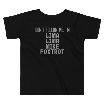 "Don’t follow me, I'm Lima Lima Mike Foxtrot" printed on a black toddler short sleeve tee laying on a flat surface