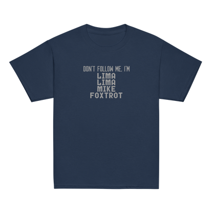 "Don’t follow me, I'm Lima Lima Mike Foxtrot" printed on a navy youth classic tee laying on a flat surface