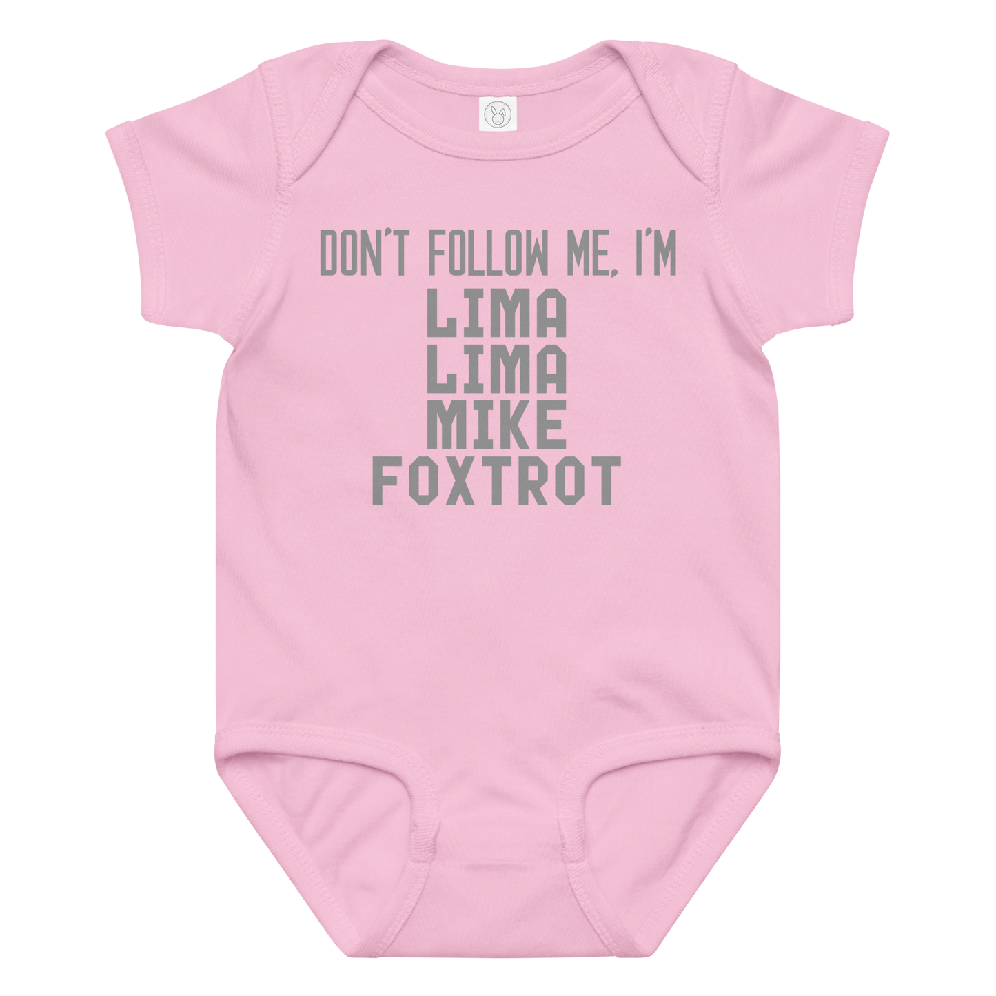 "Don’t follow me, I'm Lima Lima Mike Foxtrot" printed on a pink baby jersey bodysuit laying on a flat surface amongst other clothes
