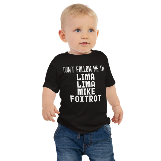 "Don’t follow me, I'm Lima Lima Mike Foxtrot" printed on a black baby jersey short sleeve tee worn by a male