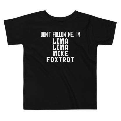 "Don’t follow me, I'm Lima Lima Mike Foxtrot" printed on a black toddler short sleeve tee laying on a flat surface