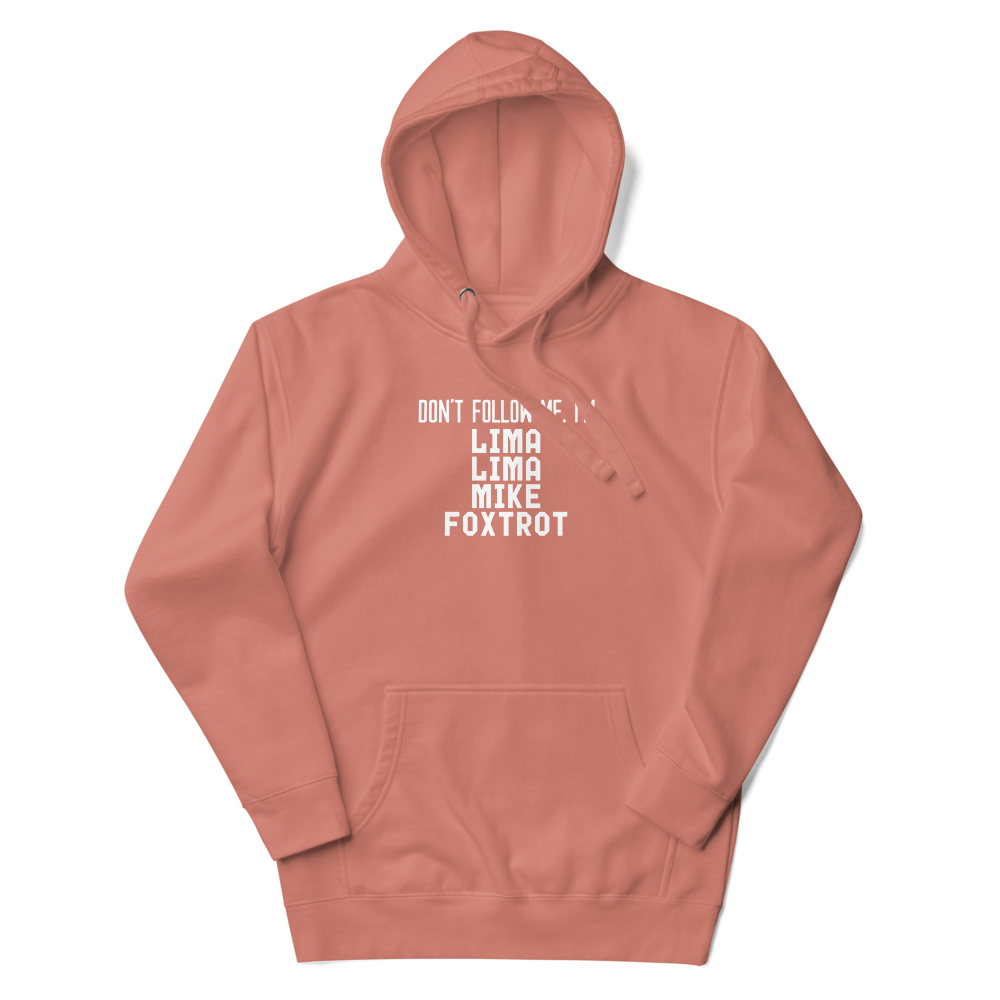 "Don’t follow me, I'm Lima Lima Mike Foxtrot" printed on a dusty rose unisex hoodie laying on a flat surface with the hood up