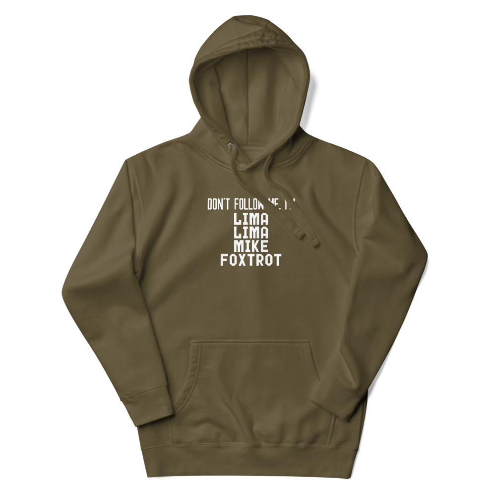"Don’t follow me, I'm Lima Lima Mike Foxtrot" printed on a military green unisex hoodie laying on a flat surface with the hood up