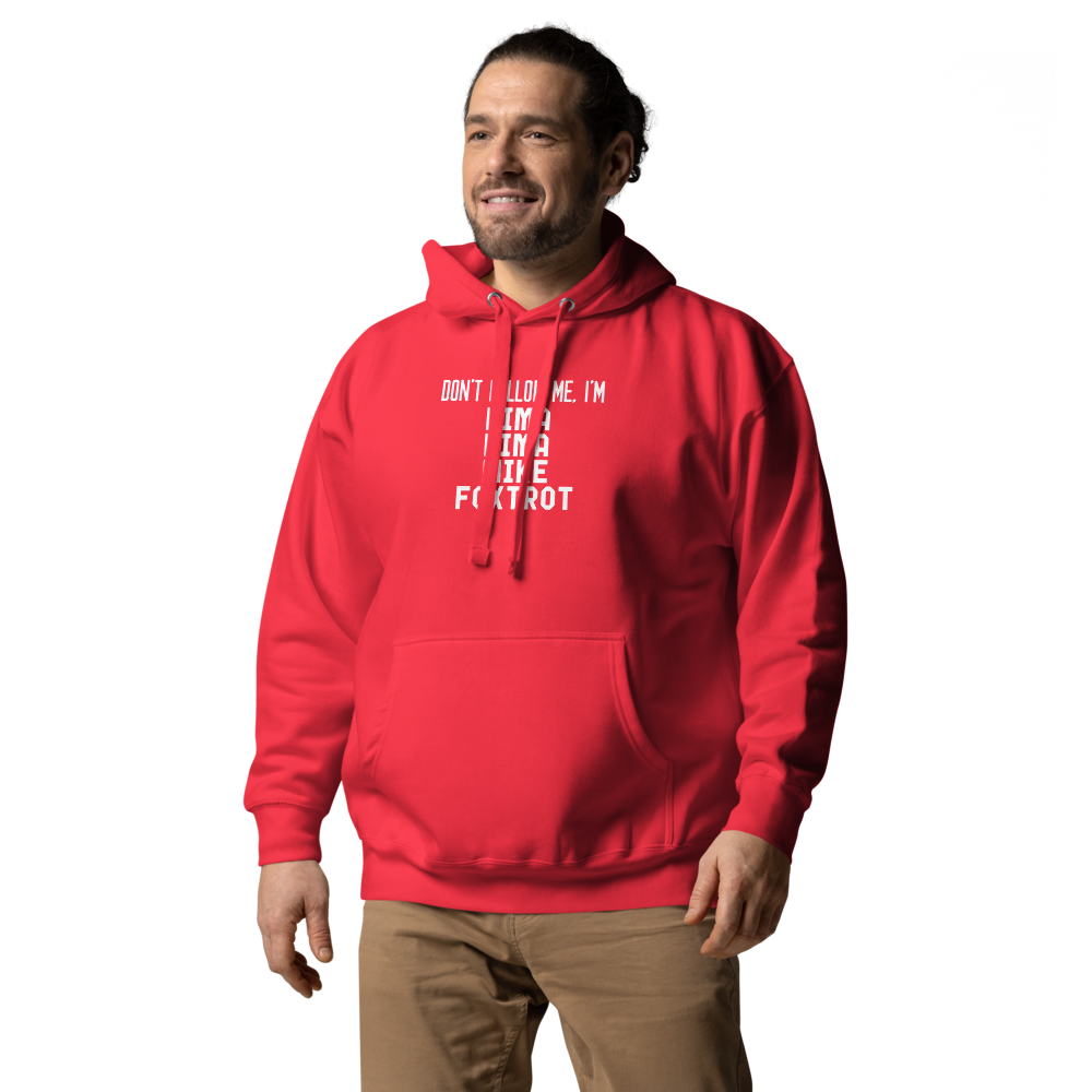 "Don’t follow me, I'm Lima Lima Mike Foxtrot" printed on a team red unisex hoodie worn by a male
