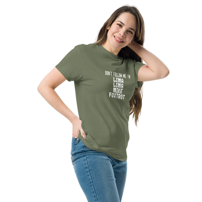 "Don’t follow me, I'm Lima Lima Mike Foxtrot" printed on a military green unisex classic tee worn by a female