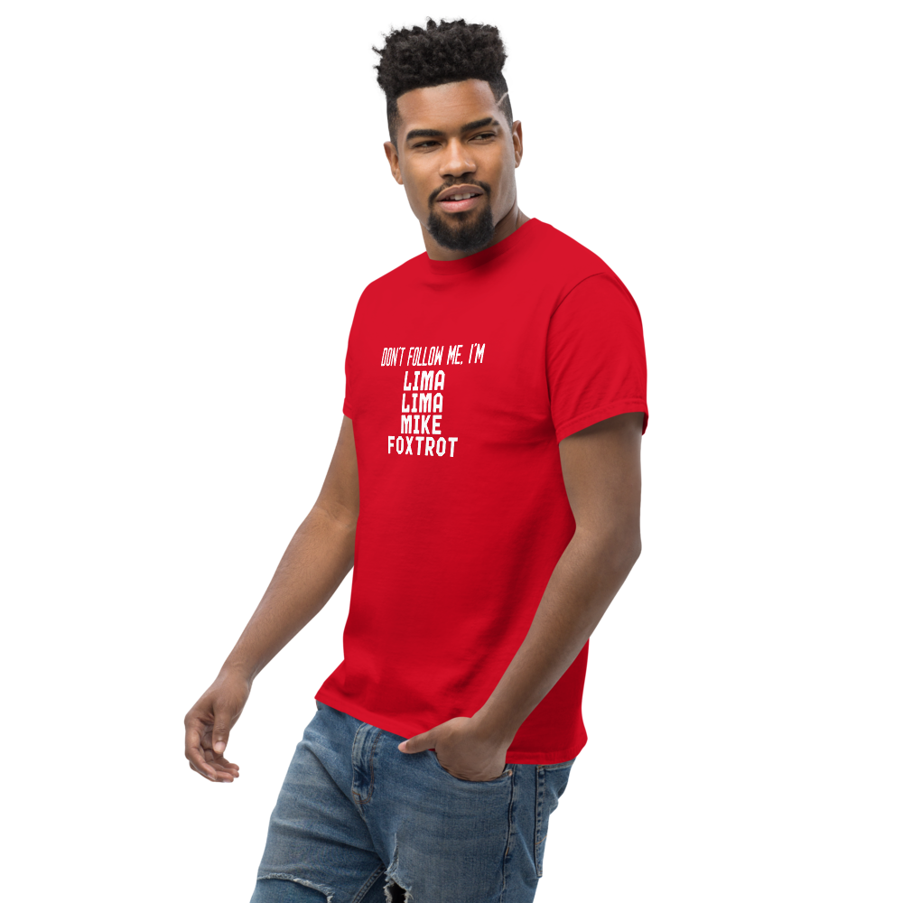 "Don’t follow me, I'm Lima Lima Mike Foxtrot" printed on a red unisex classic tee worn by a male