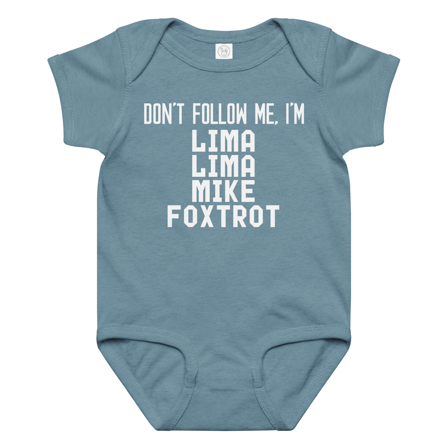 "Don’t follow me, I'm Lima Lima Mike Foxtrot" printed on a vintage indigo baby jersey bodysuit laying on a flat surface amongst other clothes
