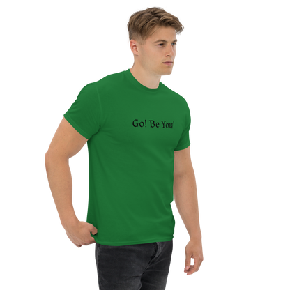 "Go! Be You!" printed on a turf green unisex classic tee worn by a male