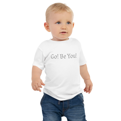 "Go! Be You!" printed on a white baby jersey short sleeve tee worn by a male