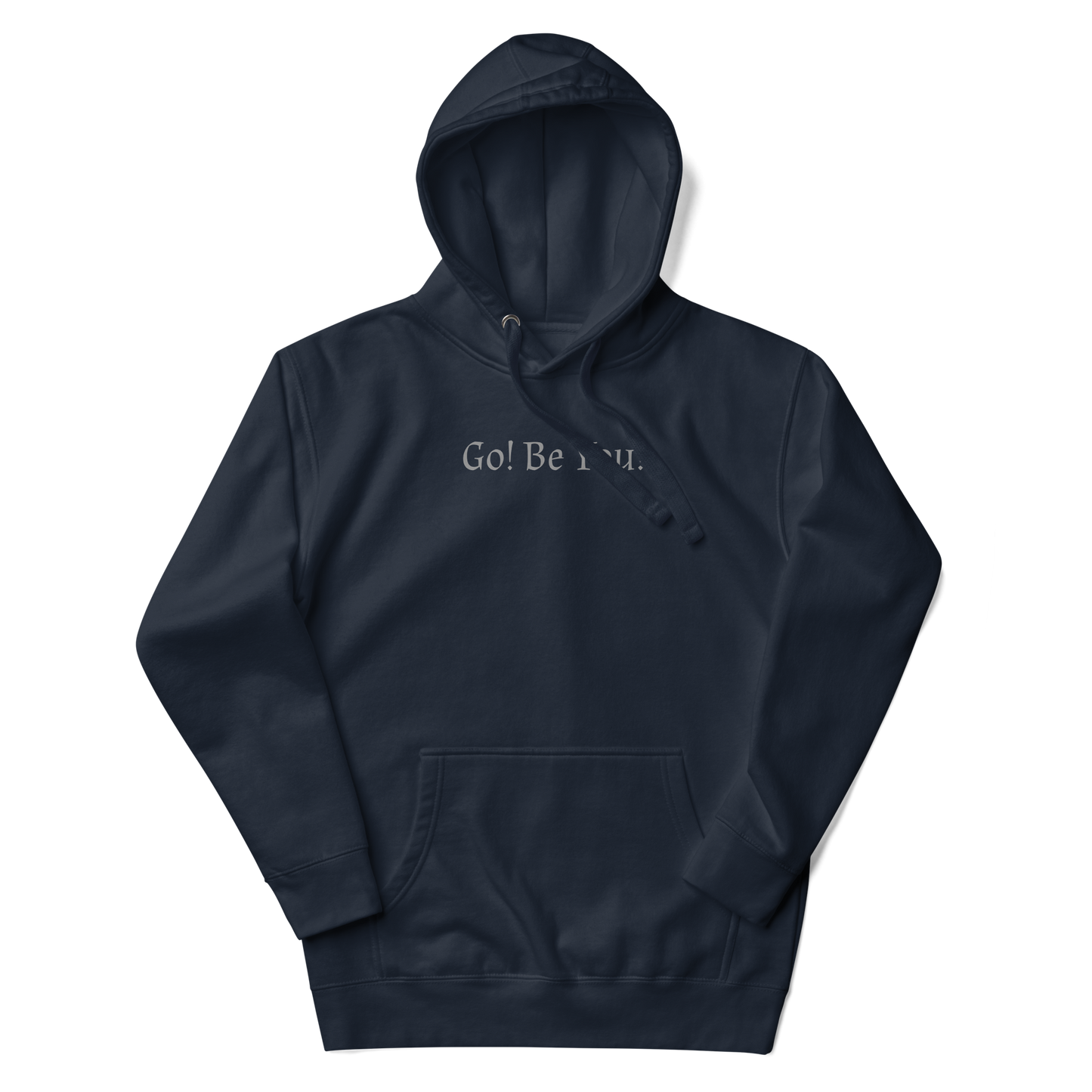 "Go! Be You!" printed on a navy blazer unisex hoodie laying on a flat surface with the hood up