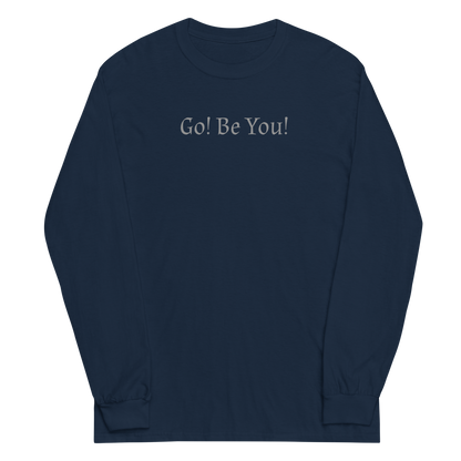 "Go! Be You!" printed on a navy men's long sleeve shirt laying on a flat surface