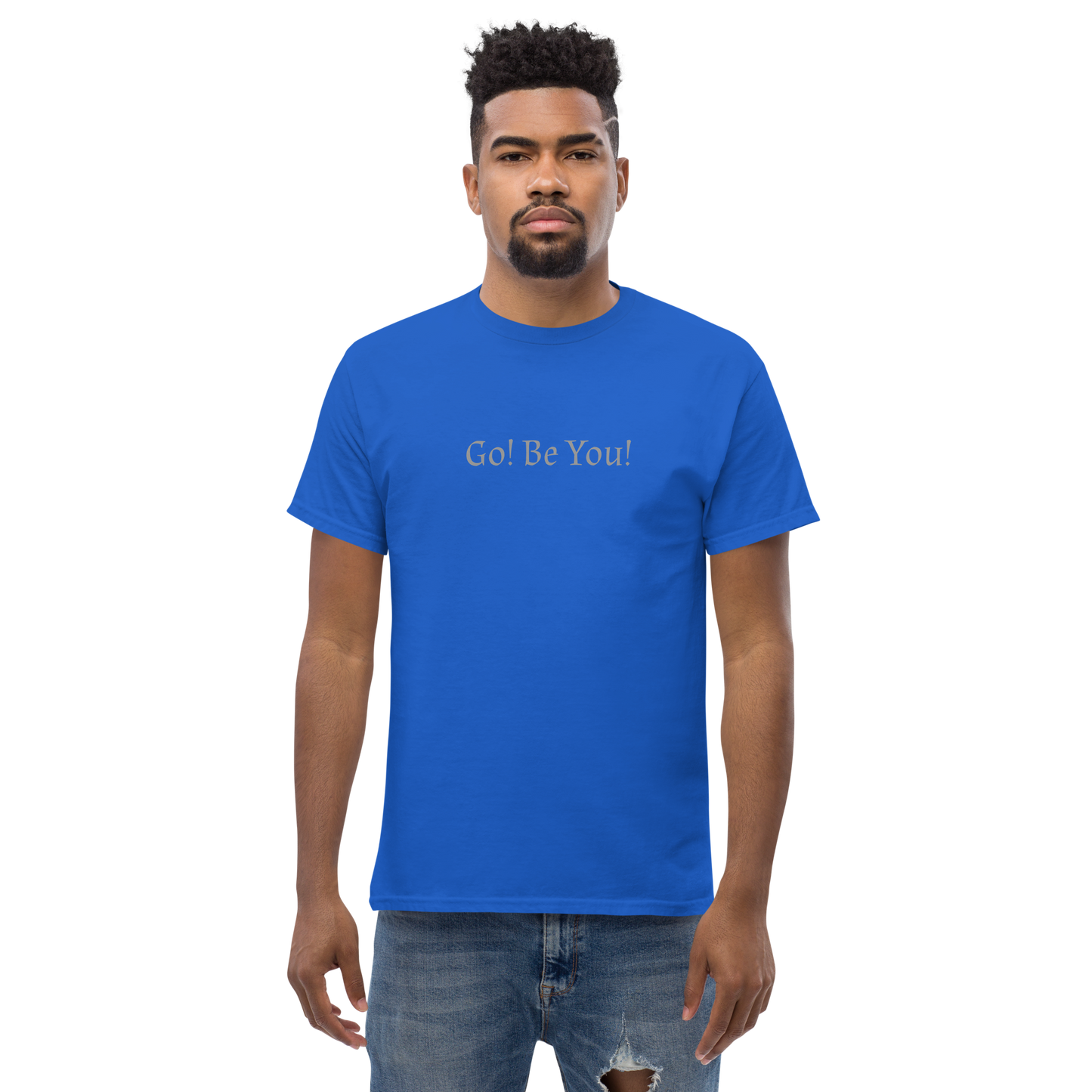"Go! Be You!" printed on a royal unisex classic tee worn by a male