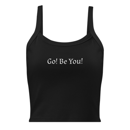 "Go! Be You!" printed on a solid black blend women's micro-rib tanktop laying on a flat surface