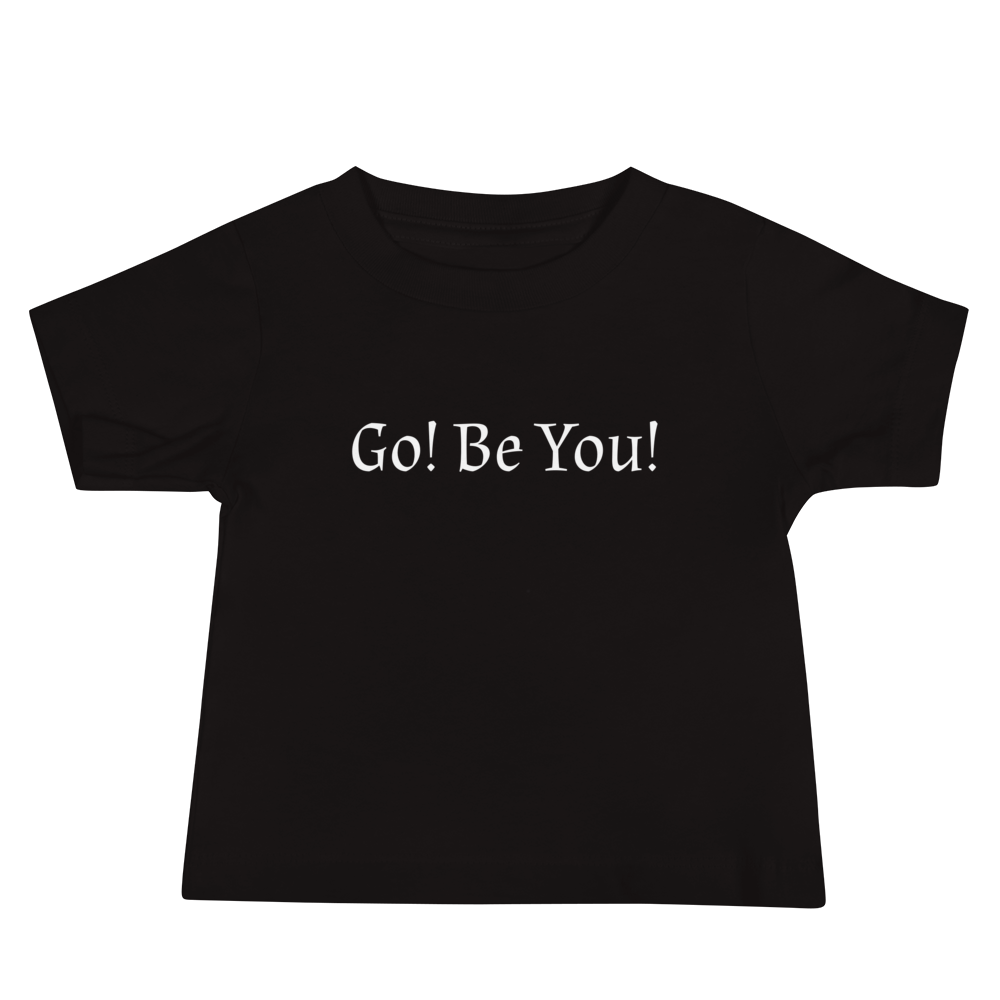 "Go! Be You!" printed on a black baby jersey short sleeve tee laying on a flat surface