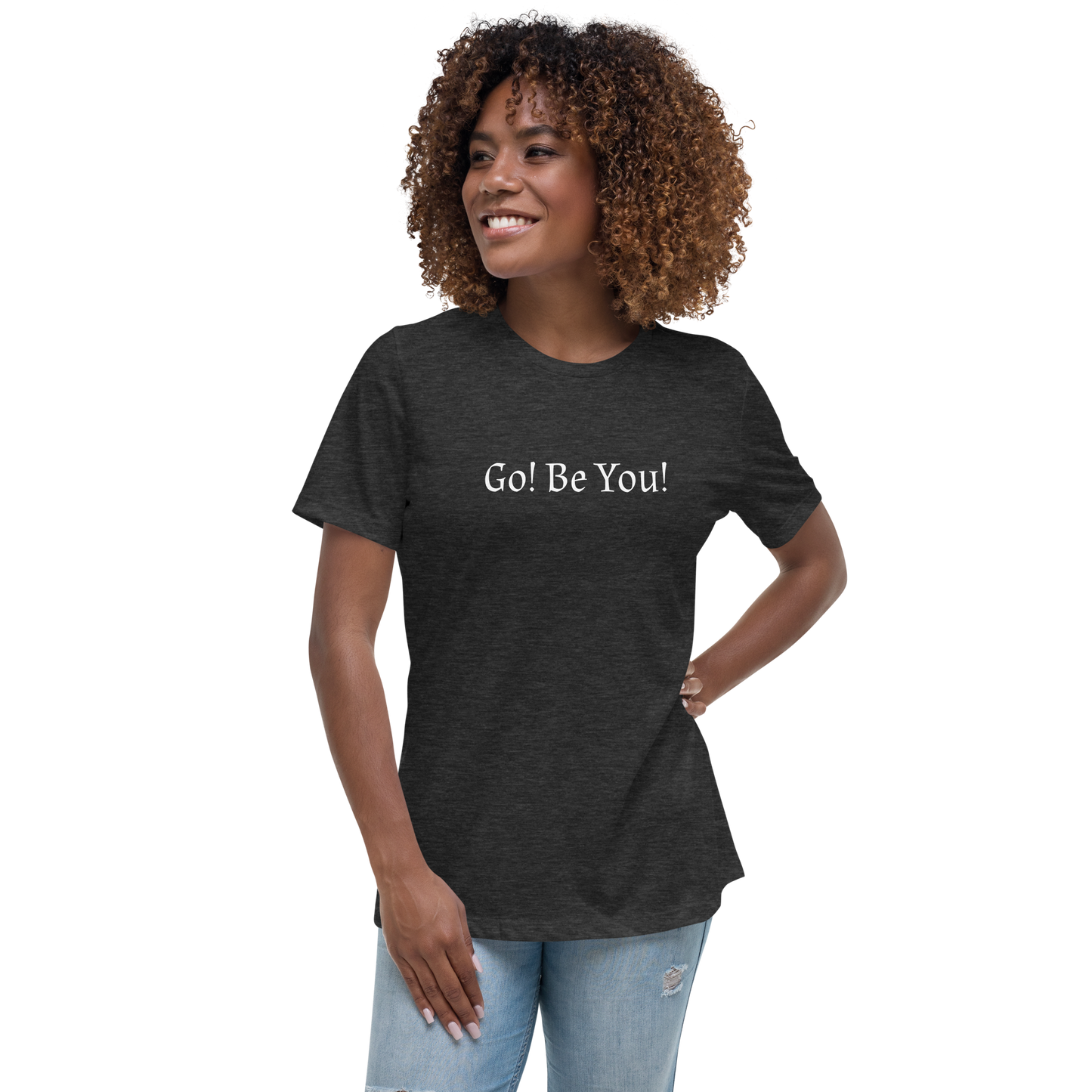 "Go! Be You!" printed on a dark grey heather women's relaxed t-shirt worn by a female