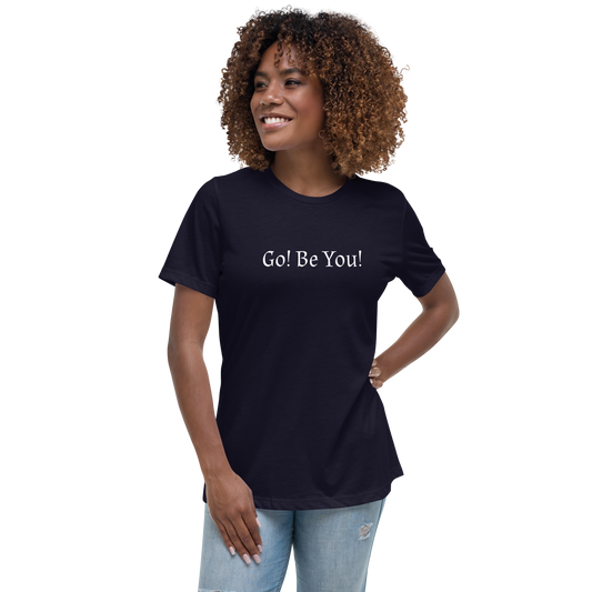 "Go! Be You!" printed on a navy women's relaxed t-shirt worn by a female