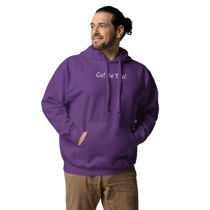 "Go! Be You!" printed on a purple unisex hoodie worn by a male