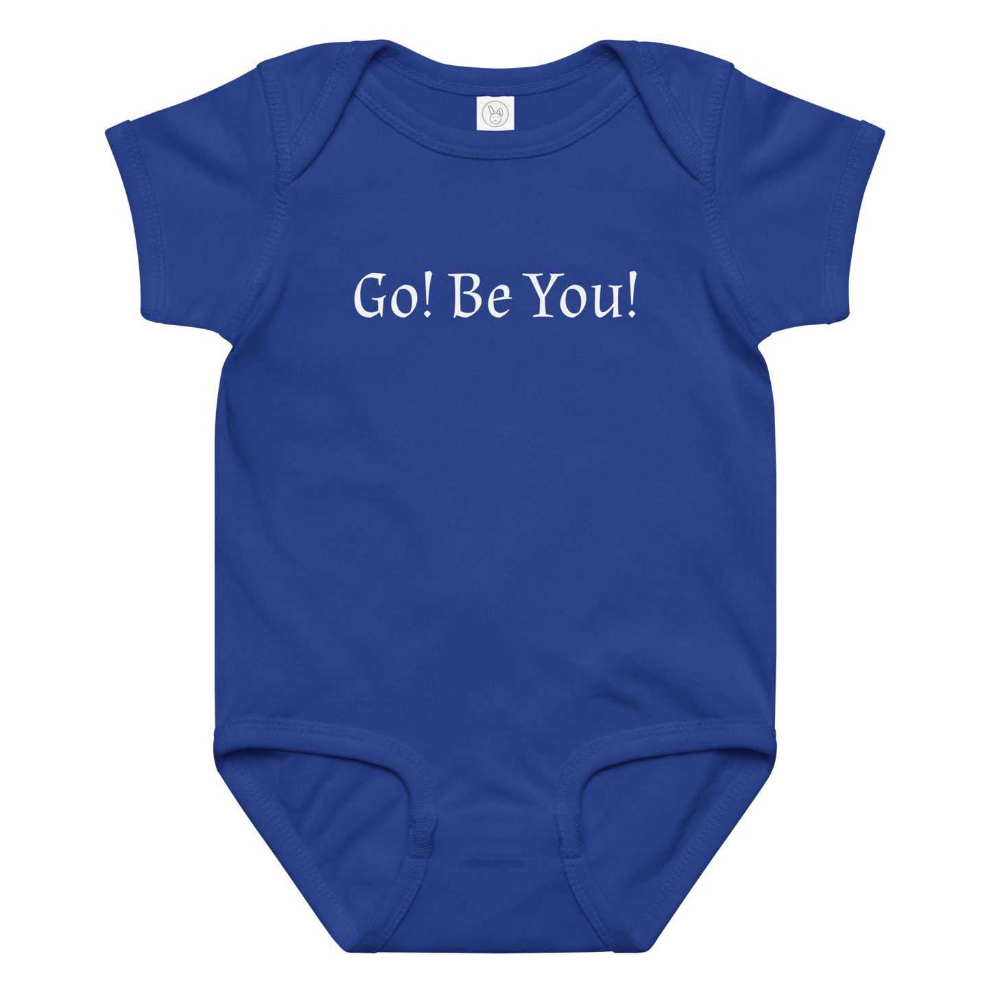 "Go! Be You!" printed on a royal baby jersey bodysuit laying on a flat surface amongst other clothes
