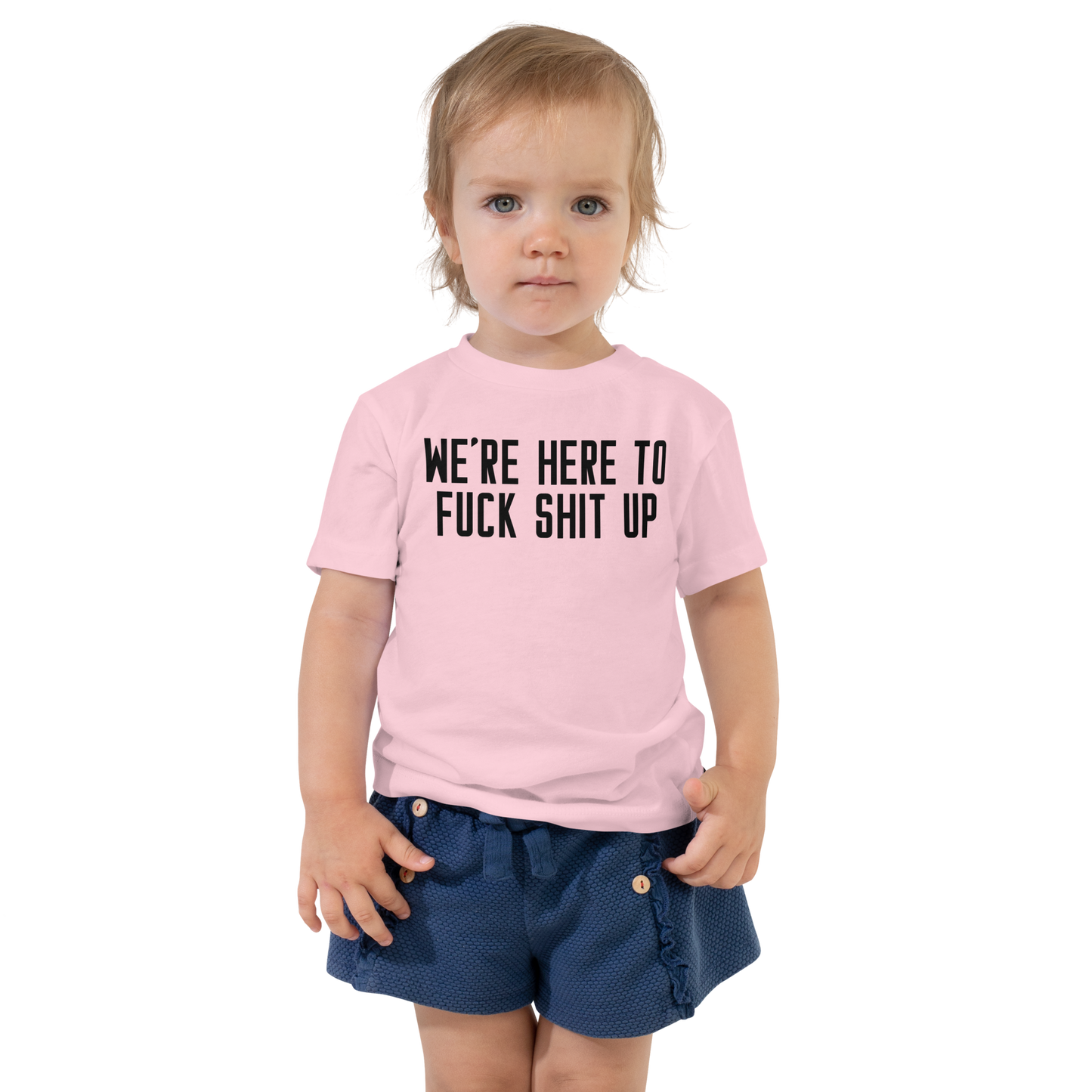 "We're Here To Fuck Shit Up" printed on a pink toddler short sleeve tee worn by a female