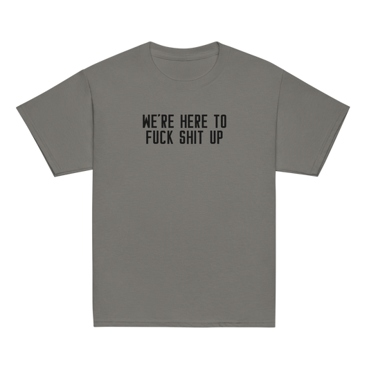 "We're Here To Fuck Shit Up" printed on a charcoal youth classic tee laying on a flat surface