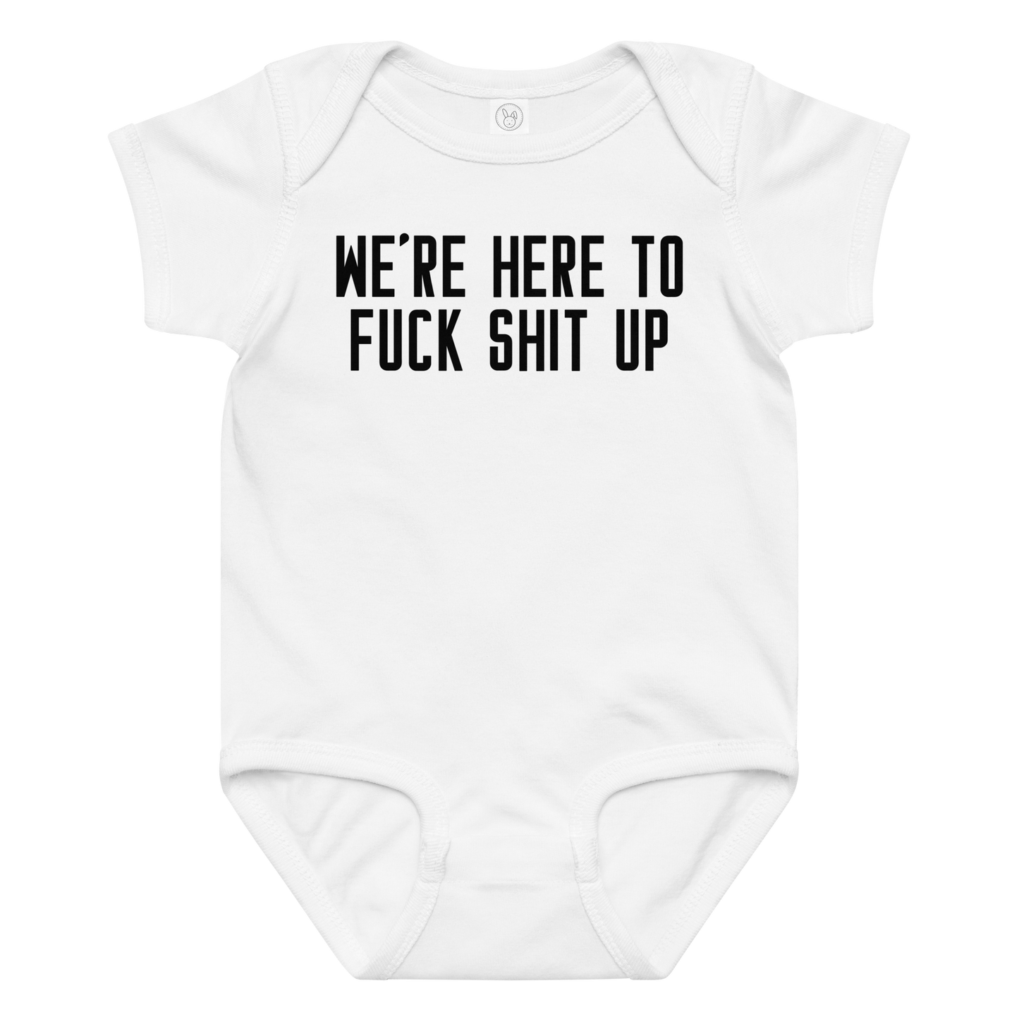 "We're Here To Fuck Shit Up" printed on a white baby jersey bodysuit laying on a flat surface amongst other clothes