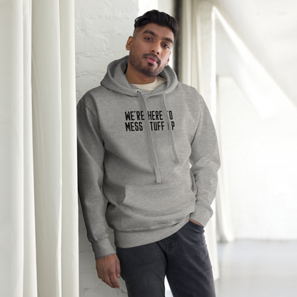 "We're Here To Mess Stuff Up" printed on a carbon grey unisex hoodie worn by a male